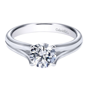 Gabriel & Co. ER7516PTJJJ platinum Contemporary engagement ring, front view of the round center cradled low where the grooved shoulders flare apart