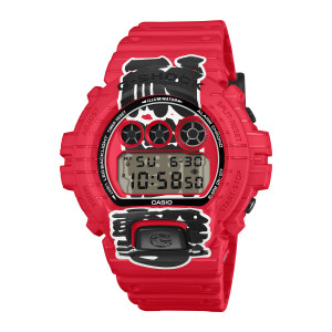 Casio G-Shock DW6900AKA-4 watch, front view of three red rimmed round dials above a pale gray panel with black characters