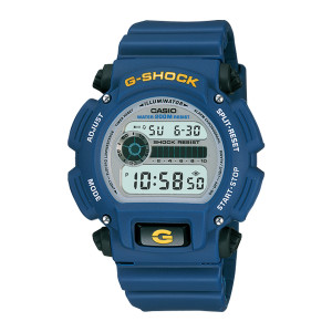 Casio G-Shock DW9052-2V watch, front view of the pale gray digital panel, black corner button covers and yellow lettering on blue guards