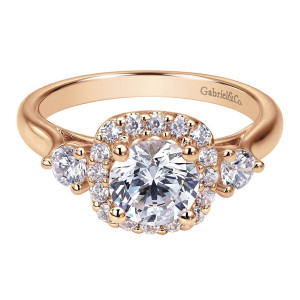 Gabriel & Co. ER7510K44JJ 14 karat rose gold Contemporary engagement ring, front view of the round center ringed by a cushion shaped halo between two larger round accents