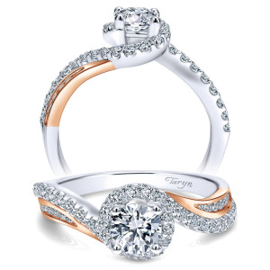 Taryn TE11834R2T44JJ 14 karat white gold engagement ring, front view of a round center in a swirling halo with bypass pave rails crossing below