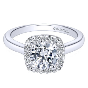 Gabriel & Co. ER6873W44JJ 14 karat white gold engagement ring, top view of a round center in a cushion shaped halo above a plain smooth shank