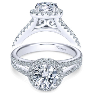 Taryn TE7260W44JJ 14 karat white gold engagement ring, front view of a round center in a single halo above a split pave shank with scrollwork gallery