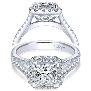 Taryn TE7262W44JJ 14 karat white gold engagement ring, front view of a princess center in a squared halo above a split pave shank with leaf gallery