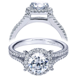 Taryn TE7276W44JJ 14 karat white gold engagement ring, front view of a round center in a round halo where the pave shank splits toward the shoulders