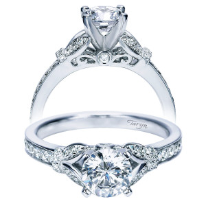 Taryn TE8003W44JJ 14 karat white gold engagement ring, front view of a round center flanked by pave leaf shapes over a bezel accent and filigree