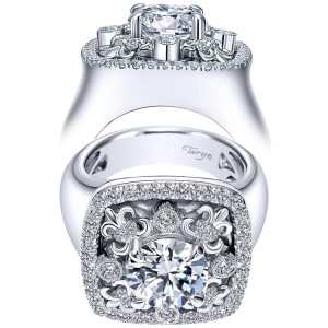 Taryn TE8463W83JJ 18 karat white gold engagement ring, front and profile views of a round center in a squared pave halo with scrolled fleur motifs