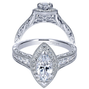 Taryn TE8812W44JJ 14 karat white gold engagement ring, front and profile views of a marquise center in a matching halo above bead set shoulder stones