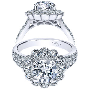 Taryn TE8934W83JJ 18 karat white gold engagement ring, front and side views of a round center in a flower shaped halo above wide pave shoulders