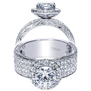 Taryn TE8986W44JJ 14 karat white gold engagement ring, front and side views of a round center haloed above a very wide multi row pave shank