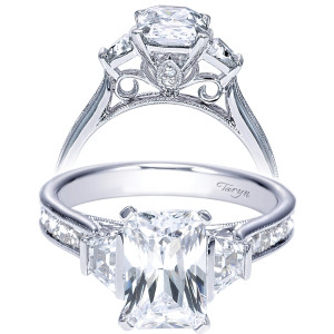 Taryn TE9046W44JJ 14 karat white gold engagement ring, front view of the center stone between trapezoid side stones above bead set shoulders with milgrain