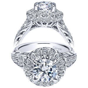 Taryn TE9068W83JJ 18 karat white gold engagement ring, front view of a round center inside a domed scalloped halo above engraved wheat shoulders