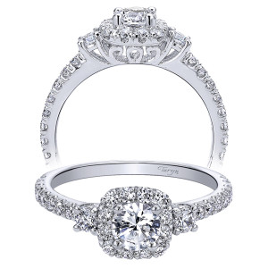 Taryn TE910152W44JJ 14 karat white gold engagement ring, angled and profile views of a cushion halo flanked by two larger side stones on pave shoulders