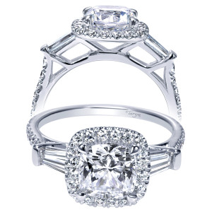 Taryn TE9193W44JJ 14 karat white gold engagement ring, front view of a cushion center in a single halo between tapered baguette sides, pave shank