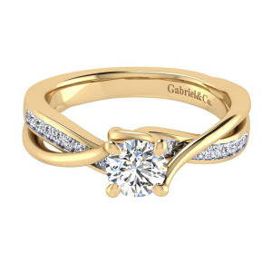 Gabriel & Co. ER6360Y44JJ 14 karat yellow gold Contemporary engagement ring, front view of the round center in four prongs where a pave rail crosses a plain one