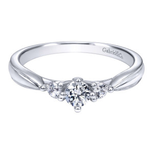 Gabriel & Co. ER910070W44JJ 14 karat white gold Contemporary engagement ring, top view of the three stone row with milgrain edging along the flat tapered shoulders