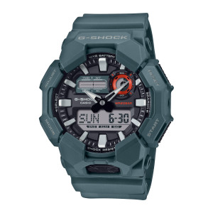 Casio G-Shock GA010-2A watch, front view of faceted teal guards, white block markers and a red ringed sub dial on black