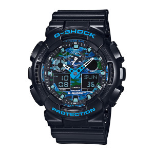 Casio G-Shock GA100CB-1A watch, front view of a camouflage blue dial, pale blue hands and two black digital panels