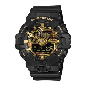 Casio G-Shock GA700CF-1A watch, front view of the gold tone hands over a camouflage dial above a black digital panel