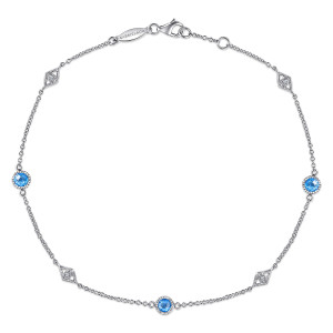 Gabriel & Co. AB935SVJMC sterling silver Contemporary anklet, front view of the loop with blue round stations, lozenge frames and an oval maker's tag