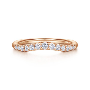Gabriel & Co. AN10963K44JJ 14 karat rose gold Classic anniversary band, front view of the dipped lower edge with the largest stone sitting at the lowest point
