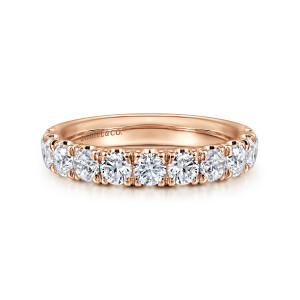 Gabriel & Co. AN11179K44JJ 14 karat rose gold Classic wedding band, front view of the row of round diamonds with shared prongs and a maker's mark inside
