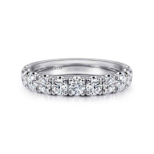 Gabriel & Co. AN11179PT4JJ platinum Classic wedding band, front view of a straight row of round diamonds with prongs shared between neighbors