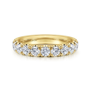 Gabriel & Co. AN11179Y44JJ 14 karat yellow gold Classic wedding band, front view of a row of round stones with a maker's mark showing on the inside