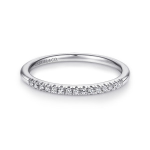 Gabriel & Co. AN11182W44JJ 14 karat white gold Classic wedding band, front view of a tilted plain band with a line of small stones across the top