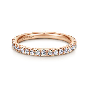 Gabriel & Co. AN11261-4K44JJ 14 karat rose gold Classic eternity wedding band, front view of round stones separated by small prong tips along the top of the band