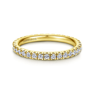 Gabriel & Co. AN11261-4Y44JJ 14 karat yellow gold Classic eternity wedding band, front view of the straight band with round diamonds in small prong cups and ridged side walls