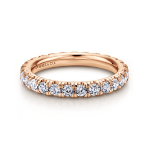 Gabriel & Co. AN11262-4K44JJ 14 karat rose gold Classic eternity ring, front view of round diamonds in a close single row above a smooth polished inner wall