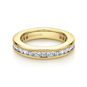 Gabriel & Co. AN11292-4Y44JJ 14 karat yellow gold Contemporary eternity band, front view of round stones in a groove between two polished rails above an open hoop