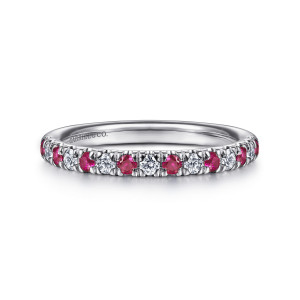 Gabriel & Co. AN14190W44RA 14 karat white gold Classic anniversary band, front view of the band with red round stones trading places with small colorless diamonds