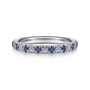 Gabriel & Co. AN14190W44SA 14 karat white gold Classic anniversary band, front view of round blue stones alternating with colorless diamonds between shared prongs