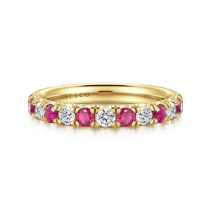 Gabriel & Co. AN14191Y44RA 14 karat yellow gold Classic anniversary band, front view of round pink red stones alternating with colorless diamonds between shared prongs