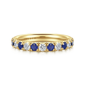 Gabriel & Co. AN14191Y44SA 14 karat yellow gold Classic anniversary band, front view of round blue and colorless stones alternating between shared prongs