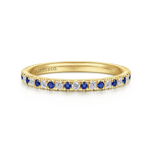 Gabriel & Co. AN14252Y44SA 14 karat yellow gold Classic anniversary band, front view of a single row of alternating blue stones and diamonds above a smooth inner hoop