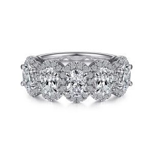 Gabriel & Co. AN15132W44JJ 14 karat white gold Contemporary anniversary band, front view of five elongated stones, each ringed by a halo of tiny round stones