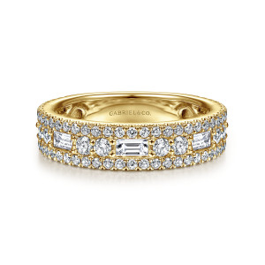 Gabriel & Co. AN15294Y44JJ 14 karat yellow gold Contemporary anniversary band, front view of baguette diamonds between pairs of round stones, edged by tiny stones