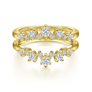 Gabriel & Co. AN15306S-Y44JJ 14 karat yellow gold Starlight anniversary band, front view of two facing curves of staggered round diamonds with an open slot between them