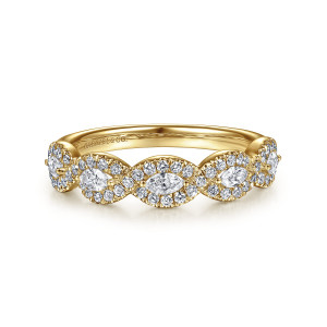 Gabriel & Co. AN15312Y44JJ 14 karat yellow gold Contemporary anniversary band, front view of marquise stones in oval frames with a maker's mark showing inside the band