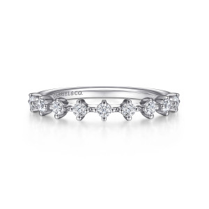 Gabriel & Co. AN15314W44JJ 14 karat white gold Starlight anniversary band, front view of spaced round diamonds each held by four prongs on thin beaded bridges