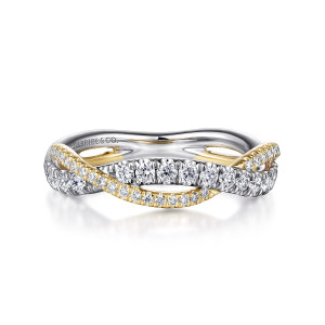 Gabriel & Co. AN15370M44JJ 14 karat white and yellow gold Contemporary anniversary band, front view of the strands crossing, larger stones on the broad strand and tiny ones on the narrow