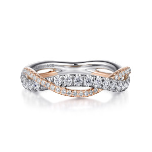 Gabriel & Co. AN15370T44JJ 14 karat white and rose gold Contemporary anniversary band, front view of the crossover strands, larger diamonds on one strand and fine diamonds on the other