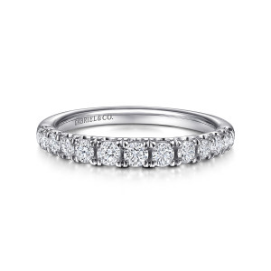 Gabriel & Co. AN15469W44JJ 14 karat white gold Classic anniversary band, front view of round stones with a maker's mark inside the band behind them