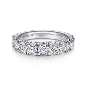 Gabriel & Co. AN15471W44JJ 14 karat white gold Classic anniversary band, front view of round diamonds divided by grooved wedge prongs along the top of the band