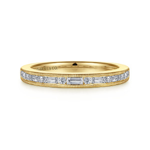Gabriel & Co. AN15571Y44JJ 14 karat yellow gold Victorian anniversary band, front view of baguette and round diamonds between two beaded milgrain edges