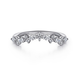 Gabriel & Co. AN15576W44JJ 14 karat white gold Starlight anniversary band, front view of the soft central dip with pointed oval stones and tiny flower shaped clusters between them