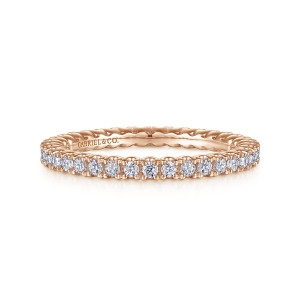 Gabriel & Co. AN15582-6K44JJ 14 karat rose gold Classic eternity band, front view of a straight row of small round diamonds with beaded prong tips and a maker's mark